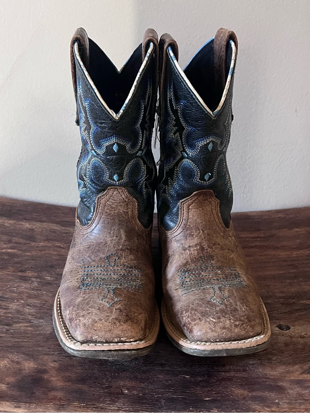 Little boy Ariat cowboy boots